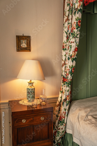 Traditional bedroom interior with mahogany furniture