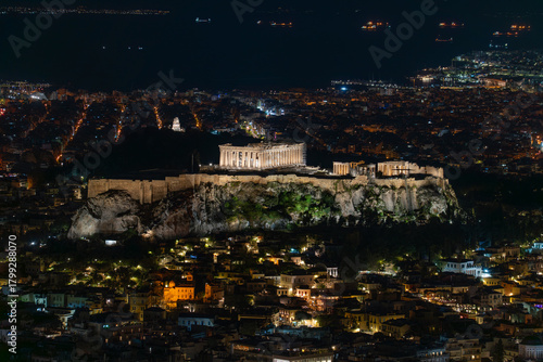 Greece, Athens, Lycabettus Hill - April 8, 2024 - Extraordinary night view of the Acropolis of Athens from Lycabettus Hill