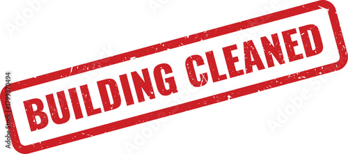 Important red distressed rubber stamp indicating Building Cleaned for hygiene and safety protocols