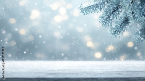 A bright snowy background with blurred white and blue tones, falling snowflakes, and pine branches at the top border, suitable for text or product display.