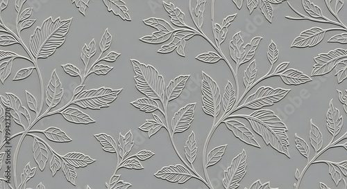 Intricate embossed floral pattern with delicate leaves and stems on a textured gray background