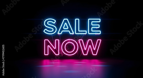 Bright neon sign displaying the words 'SALE NOW' in vibrant blue and pink colors against a dark background, creating an eye-catching promotional display
