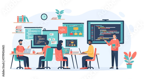 Software development team working together on coding project.