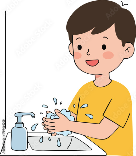 A cheerful young boy washing his hands with soap and water at a sink with a dispenser.
