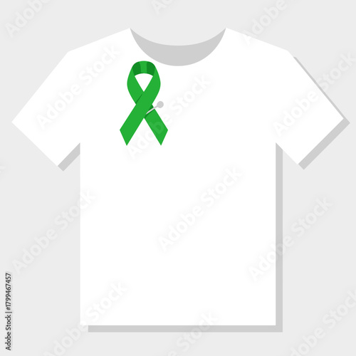 Green awareness ribbon on a white t-shirt representing support  