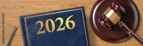 Papier peint A law book with a gavel - 2026