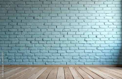 Plain blue brick wall meets light wood floor. Minimalist interior backdrop for creative design projects. Empty room offers space for text. Neutral texture.