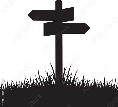 Black silhouette directional signpost with grass black and white