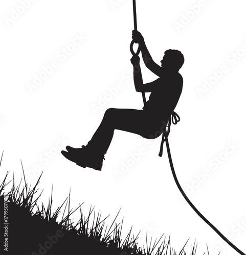 Silhouette of person on rope swing over grass vector