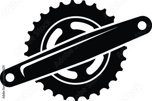 Black silhouette of a bicycle crankset with chainring on white background