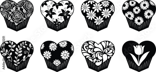 Eight black heart shaped cupcake liners with white floral and decorative patterns