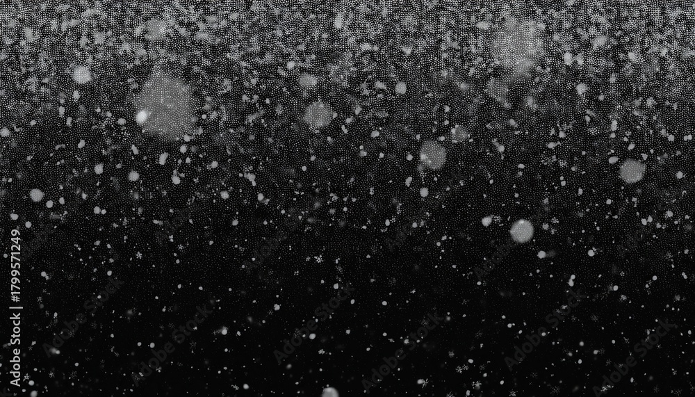 Obraz premium abstract black background with falling snow