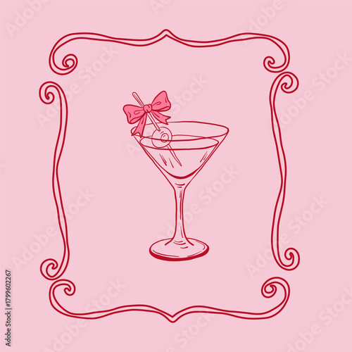 Martini glass with bow and cherry inside decorative curly frame