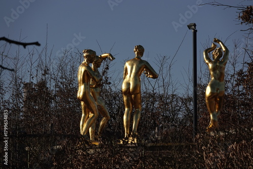 greek gold statue in park