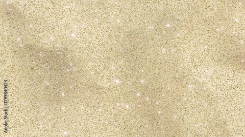 Shimmering golden glitter animation with sparkling particles and soft bokeh. Elegant festive luxury background perfect for celebrations, events, glam visuals and decorative video design.