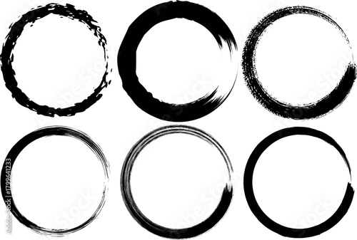 Six abstract black ink brush stroke circles on white background grunge style hand drawn shapes