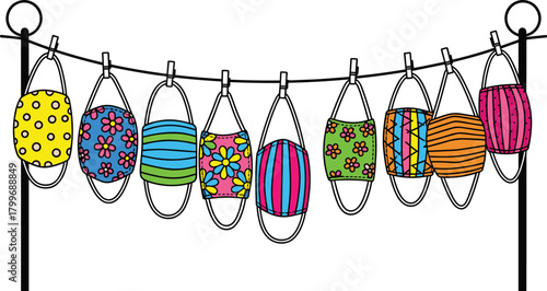 Colorful patterned face masks hanging on a clothesline with clothespins vector