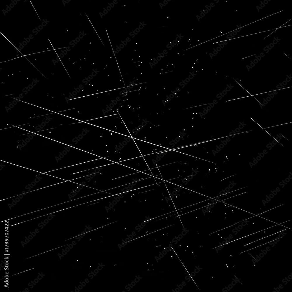 Fototapeta premium Abstract image of light streaks against a dark background, resembling shooting stars.