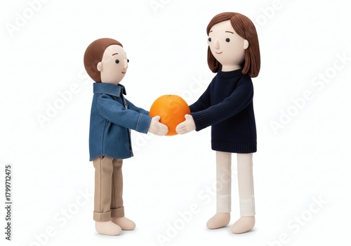 Mother and son sharing a large, bright orange, symbolizing health and sharing