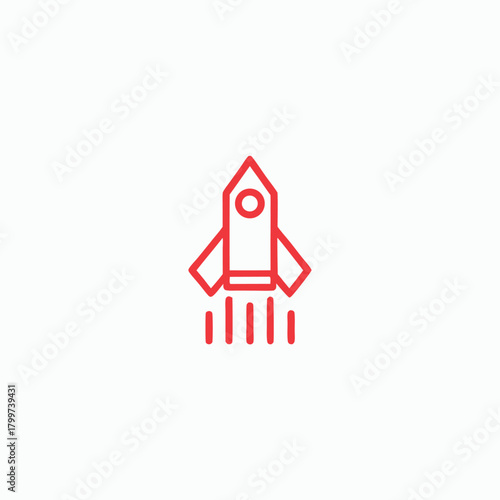 Minimalist red rocket is prepared for launch, representing technology and innovation