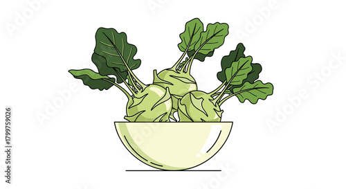 Fresh kohlrabi vegetables with green leaves in a bowl on a white background.