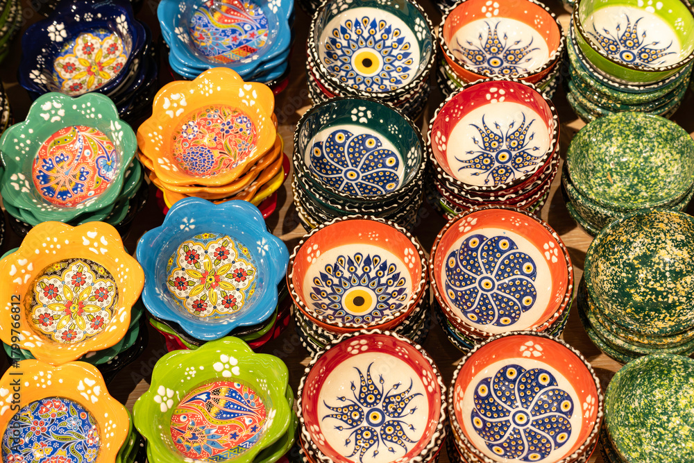 Fototapeta premium Many painted decorative plates at the Turkish bazaar.