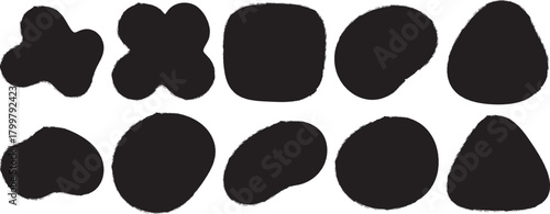 Collection of ten abstract organic black shapes with textured edges on a white background