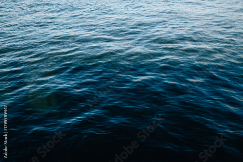 The surface of the lake with small waves