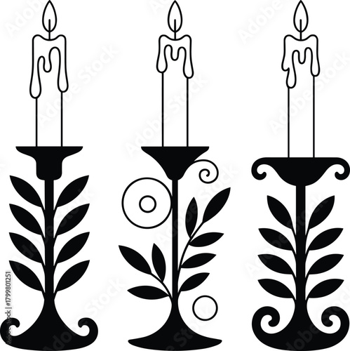 Three black silhouette candelabras with lit candles