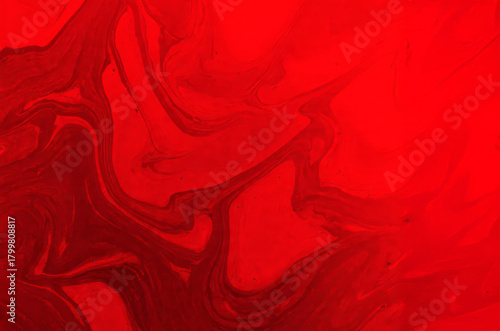 Abstract Red Marble Ink Swirl Liquid Background.