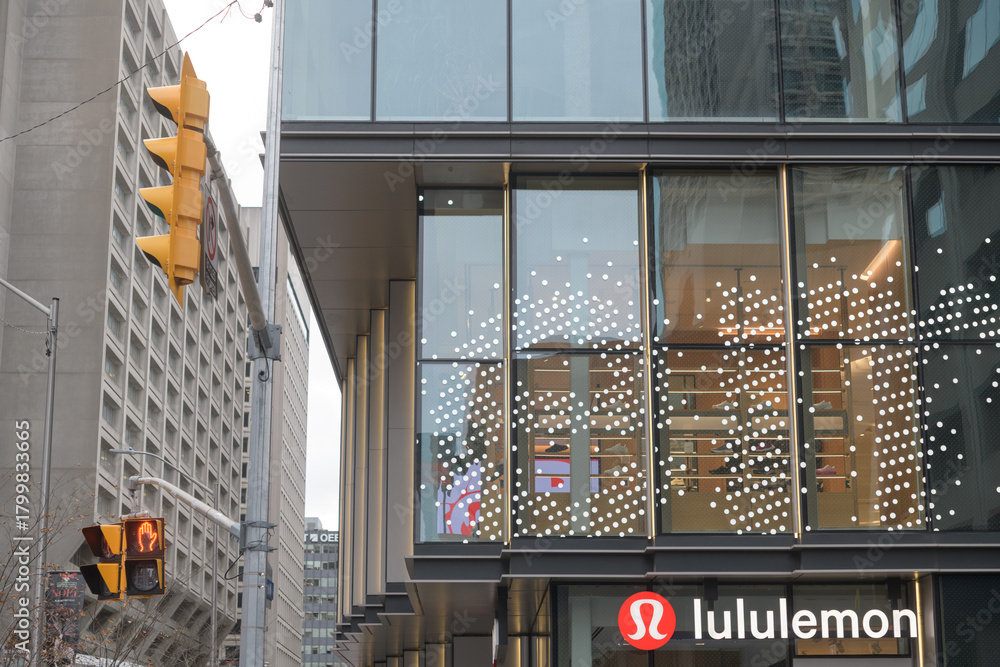 Naklejka premium exterior of lululemon, a sportswear store, located here at 2 Bloor St W, Toronto