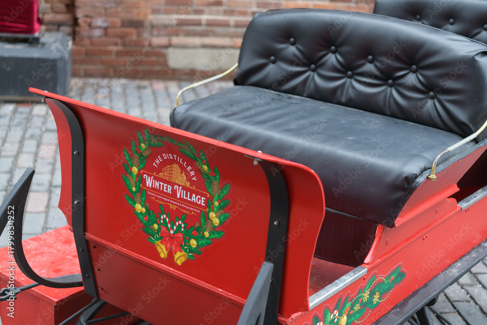 Naklejka premium Winter Village sleigh at The Distillery Historic District, Toronto