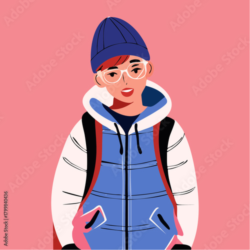 Confident young individual sporting a trendy blue beanie and glasses, layered in a warm puffer jacket and backpack, exuding a casual urban style against a vibrant pink background