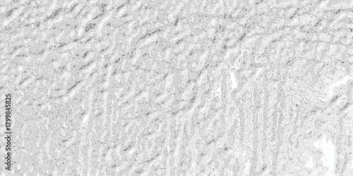 Close-up macro texture of a rough, uneven metallic surface with a brushed or hammered finish in grayscale, showcasing intricate details and subtle highlights