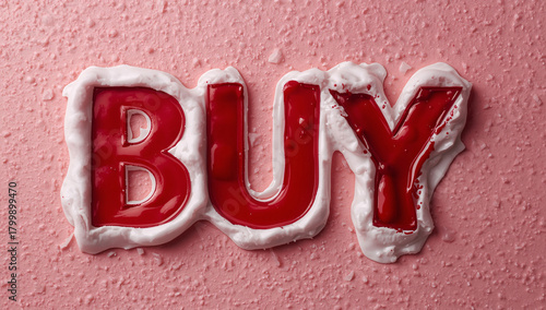 Enticing bold red buy lettering with creamy white border on textured pink background