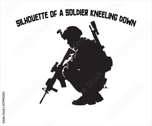 Silhouette of a Soldier Kneeling with Rifle