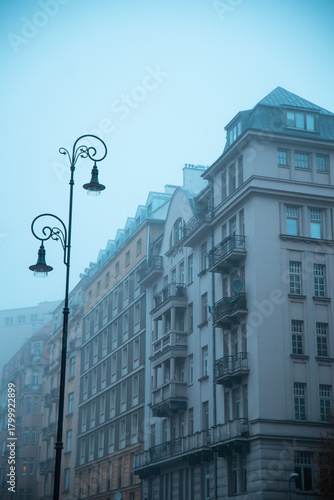 street in warsaw , city landscape evening autumn fog day