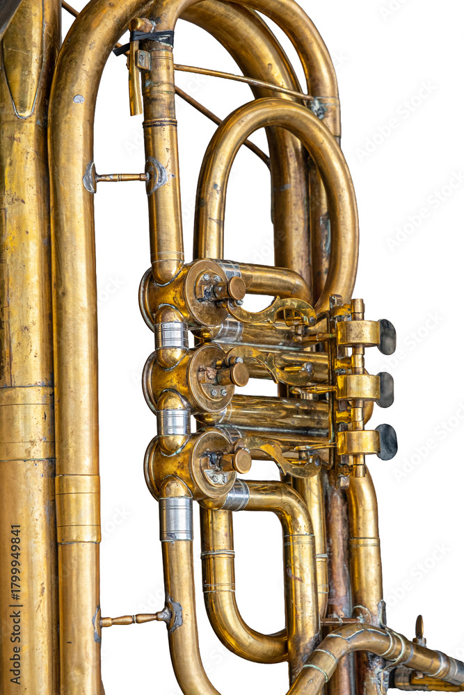 Fototapeta premium a close-up, detailed view of a brass trumpet's bell and valves. The trumpet has a worn, golden-yellow patina with visible scratches and tarnish.