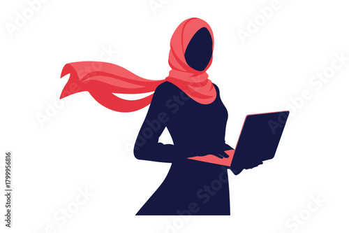 Woman in hijab working on a laptop with a flowing scarf