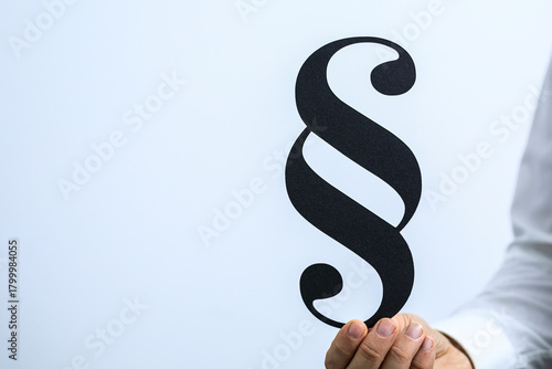 Image of a hand holding a p...