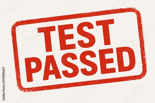 Rectangular seal TEST PASSED thick letters red ink pad impression faded edges