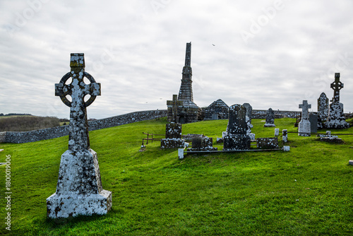 Old graves near the Rock of Cashel or Cashel of the Kings and St. Patrick Rock at Cashel, Ireland. Celtic crosses. 