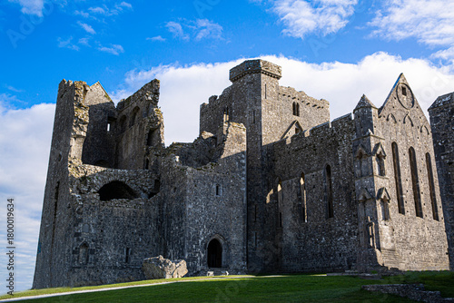 Castle the Rock of Cashel or Cashel of the Kings and St. Patrick Rock at Cashel, Ireland. Beautiful sunny weather with blue sky. 