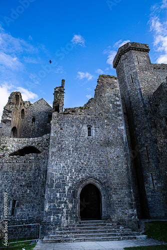 Castle the Rock of Cashel or Cashel of the Kings and St. Patrick Rock at Cashel, Ireland. Beautiful sunny weather with blue sky. 