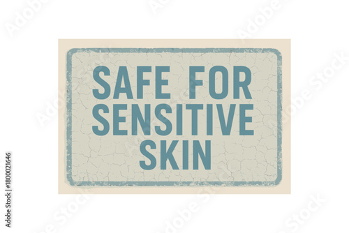 Rectangular label SAFE FOR SENSITIVE SKIN condensed geometric font light blue ink cracked surface faded edges