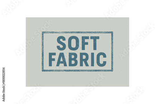Rectangular label SOFT FABRIC condensed geometric font pastel blue ink pressure marks realistic print surface