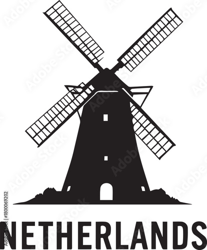 Windmill of the Netherlands: Silhouette of an iconic Dutch windmill, its blades turning against the sky, evokes a sense of heritage and scenic landscape.