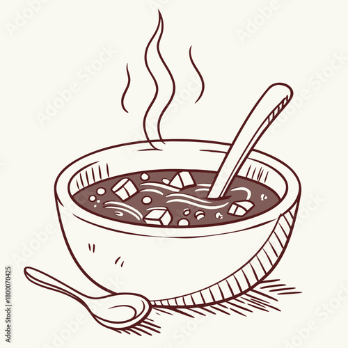Bowl of soup with a spoon
