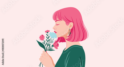 A young woman with pink hair smelling a bouquet of colorful flowers with a gentle expression on her face.