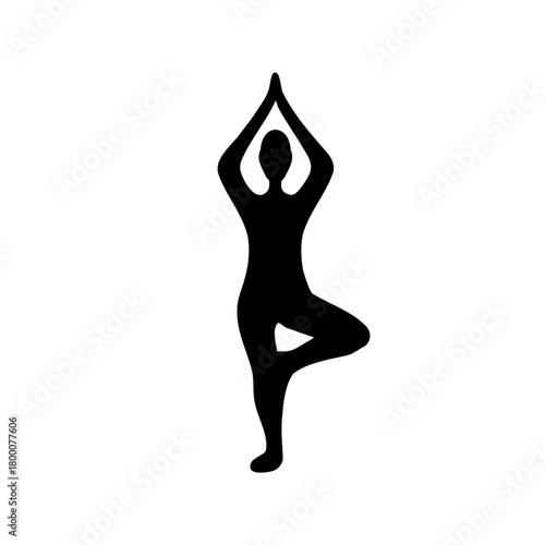 Silhouette of a person in Tree Pose, embodying mindfulness and wellness